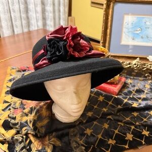 Elegant Black Hat with Red and Black Floral Accents